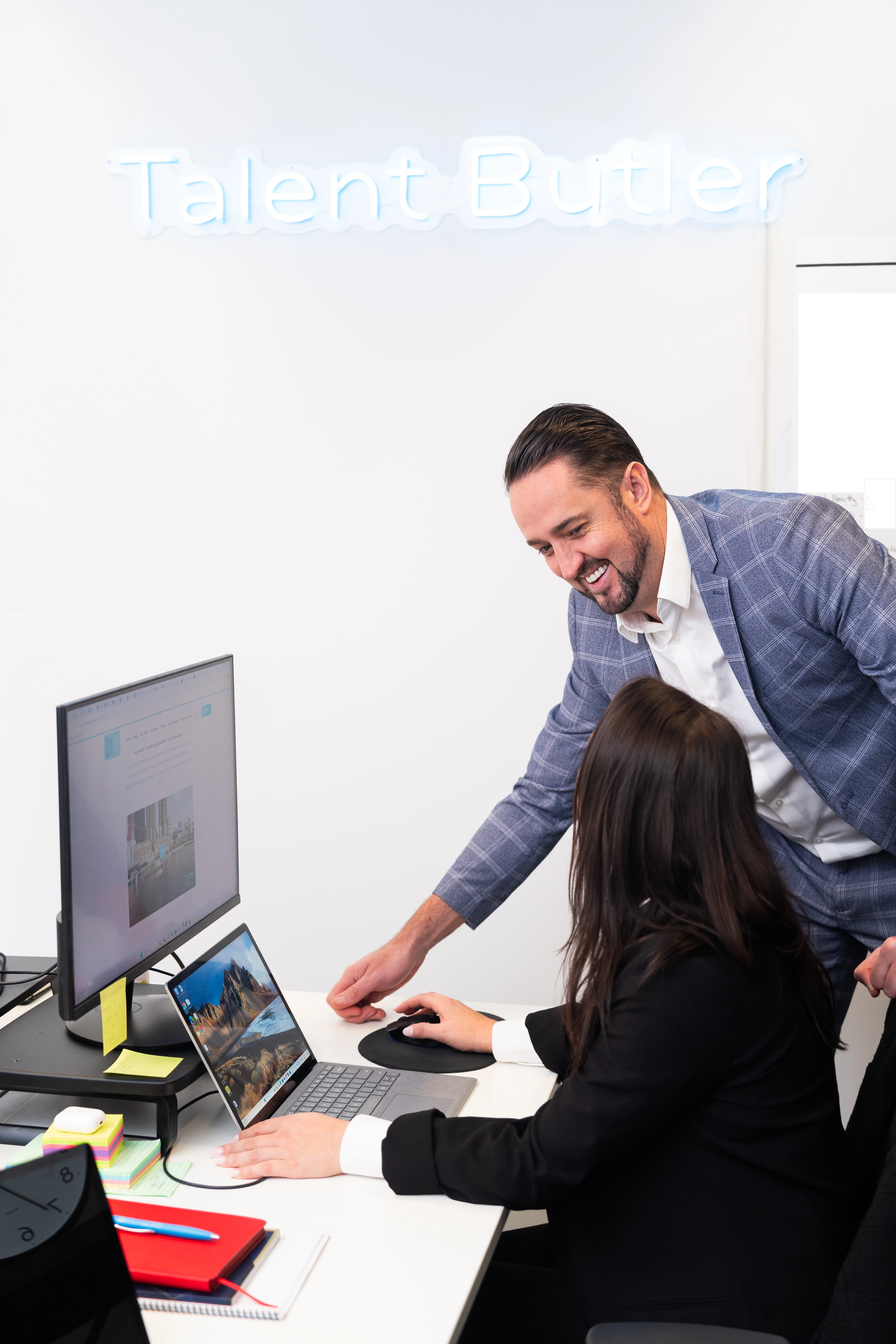 Mat and Samantha at desk