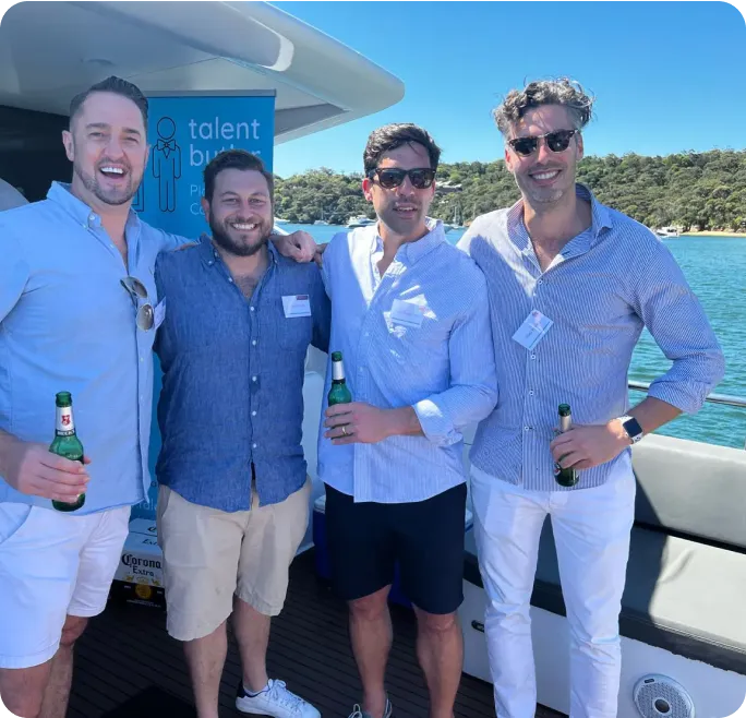 Mathew Thompson with clients on Sydney boat trip all smiling